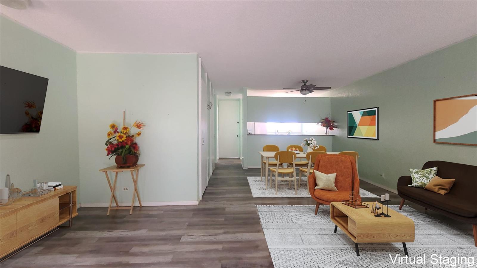 a living room with furniture and a flat screen tv