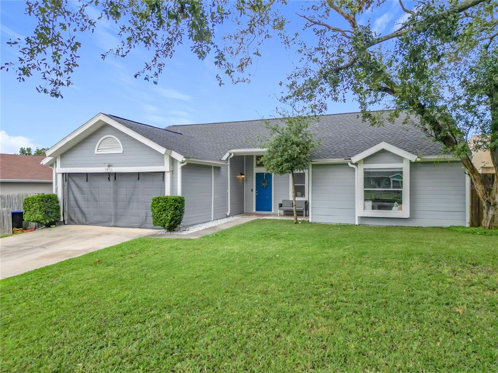 front view of a house with a yard