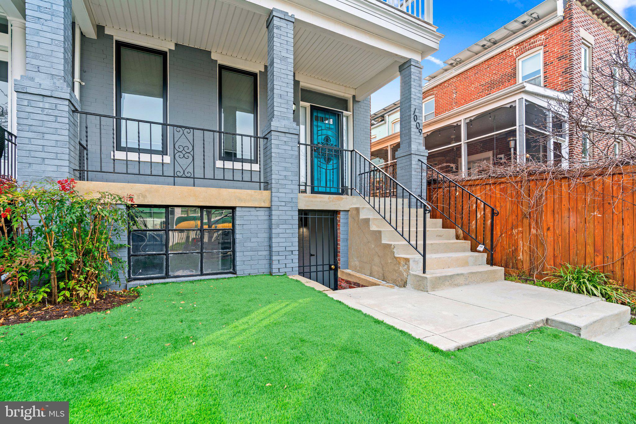 a view of front a house with a yard