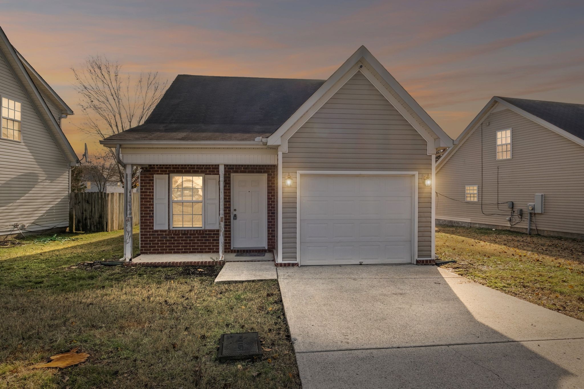 a view of a house with a yard