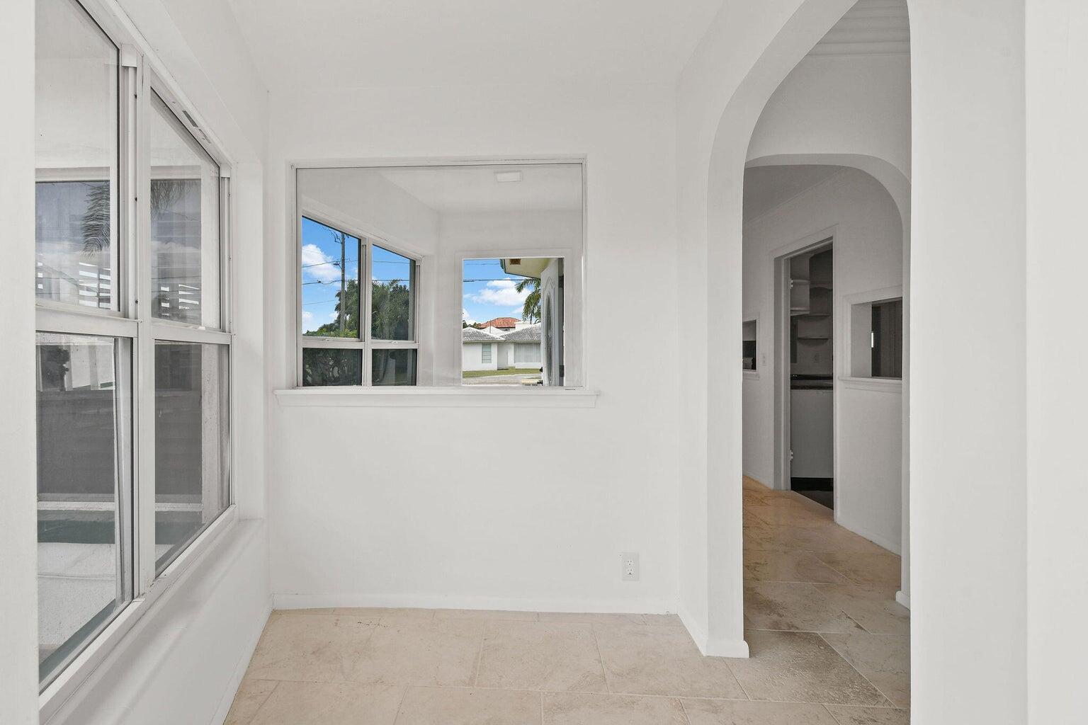 a view of livingroom with furniture and window