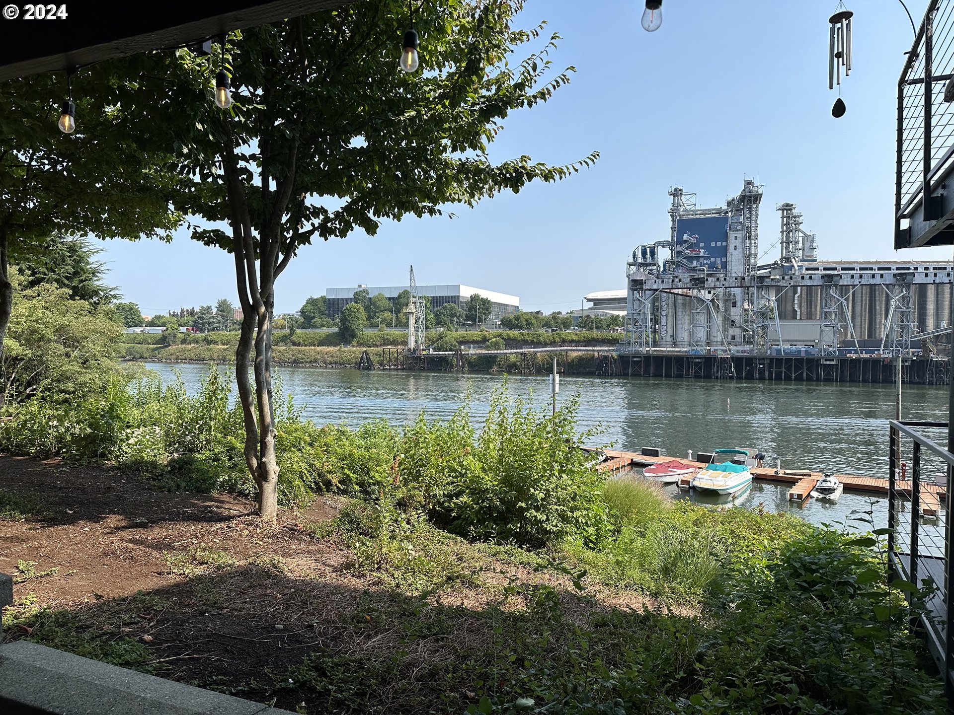 a view of a large body of water with a building in the background