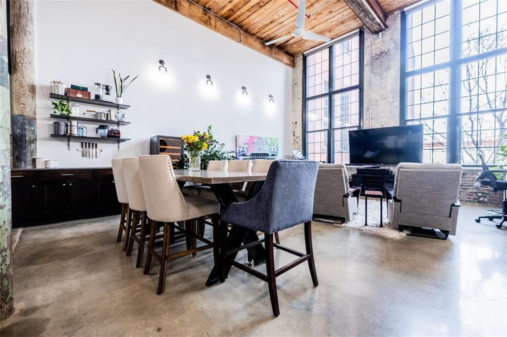 a view of a dining room with furniture