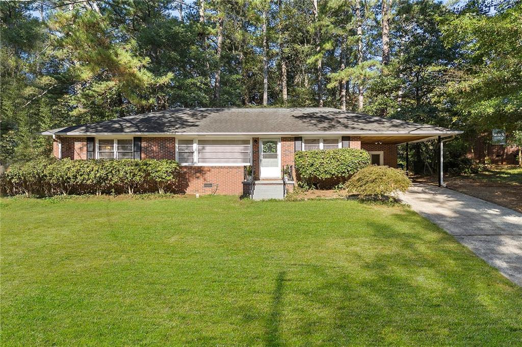 front view of a house with a yard