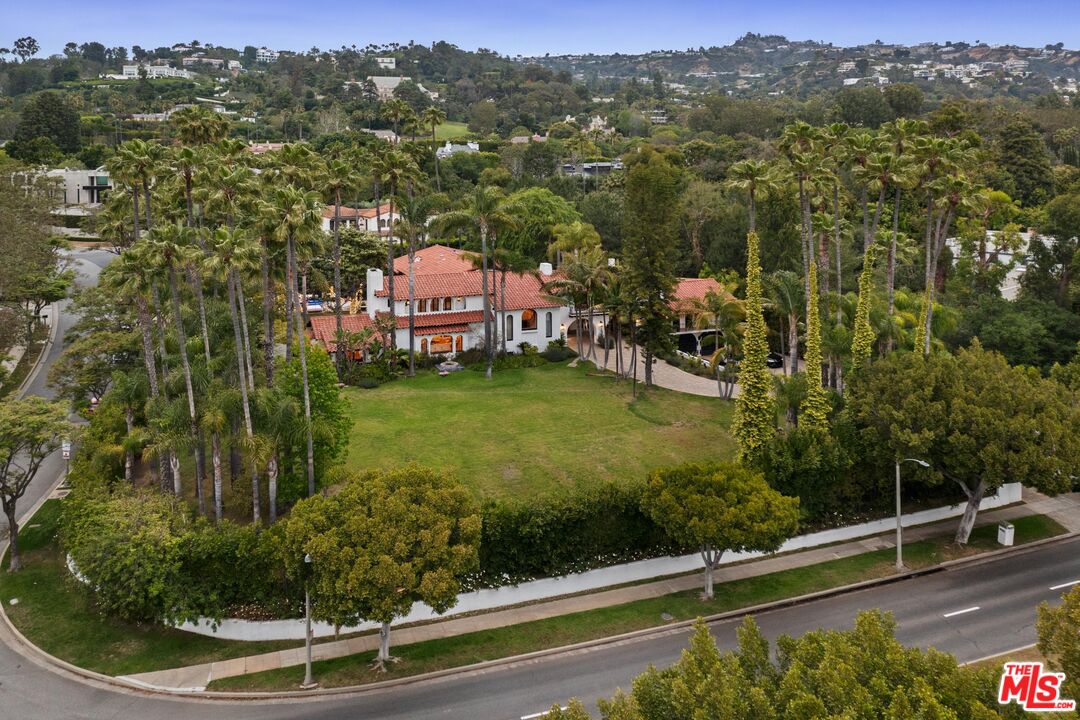 a view of a lake with a house in the background