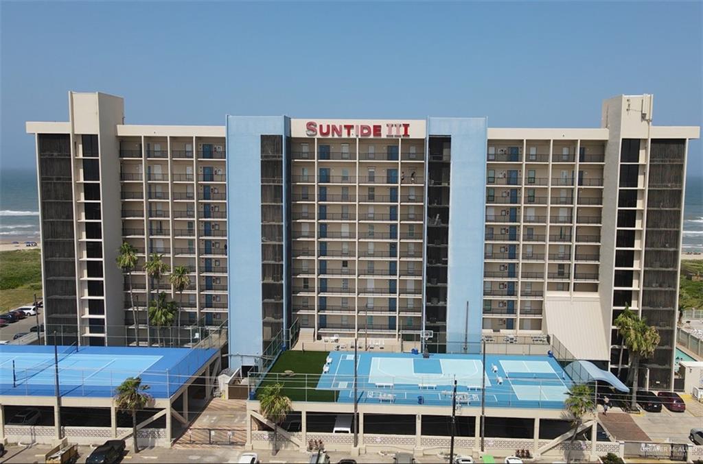 a front view of a building with glass windows