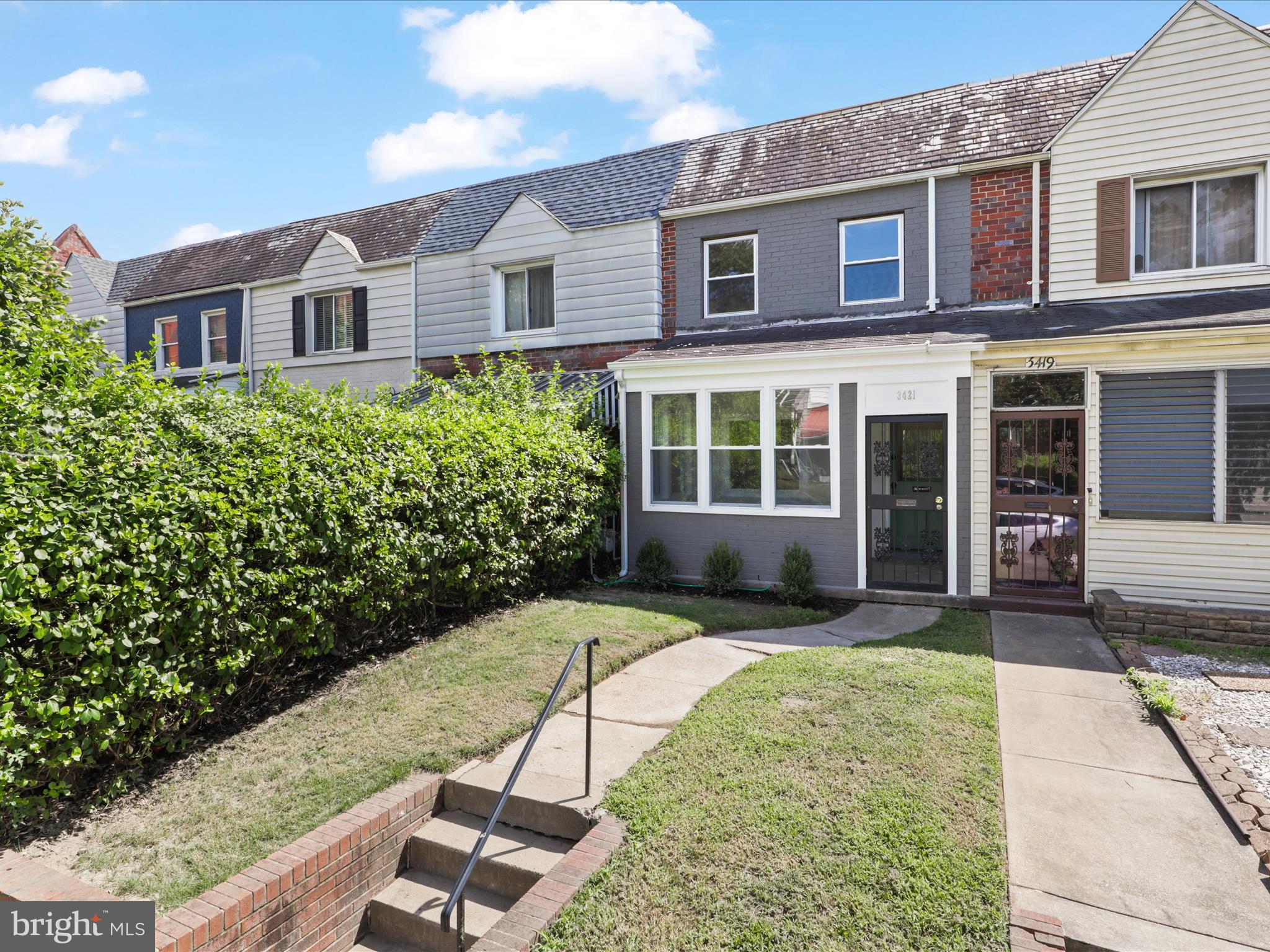 a house view with a garden space