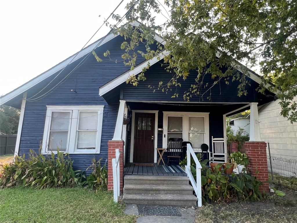 a front view of a house with a porch