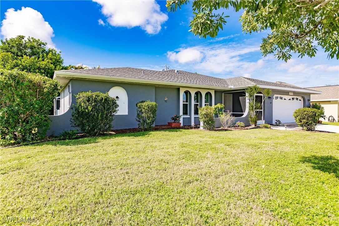 front view of house with a yard