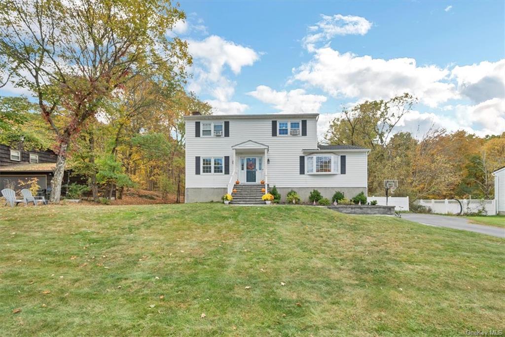 front view of a house with a big yard