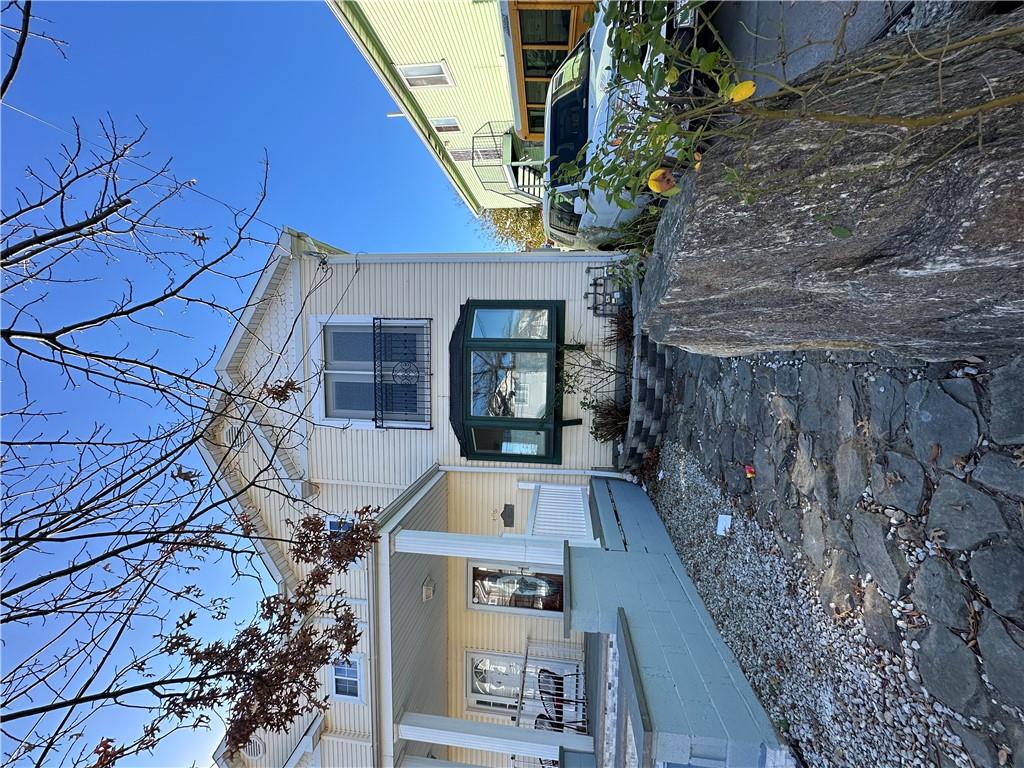 View of front of house with covered porch