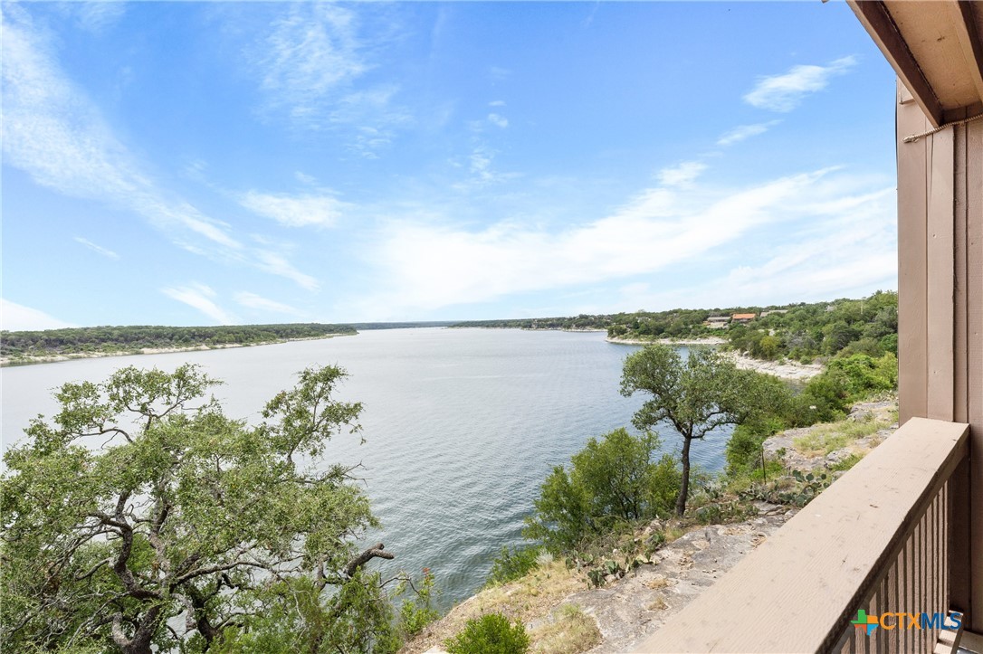 a view of a lake from a balcony