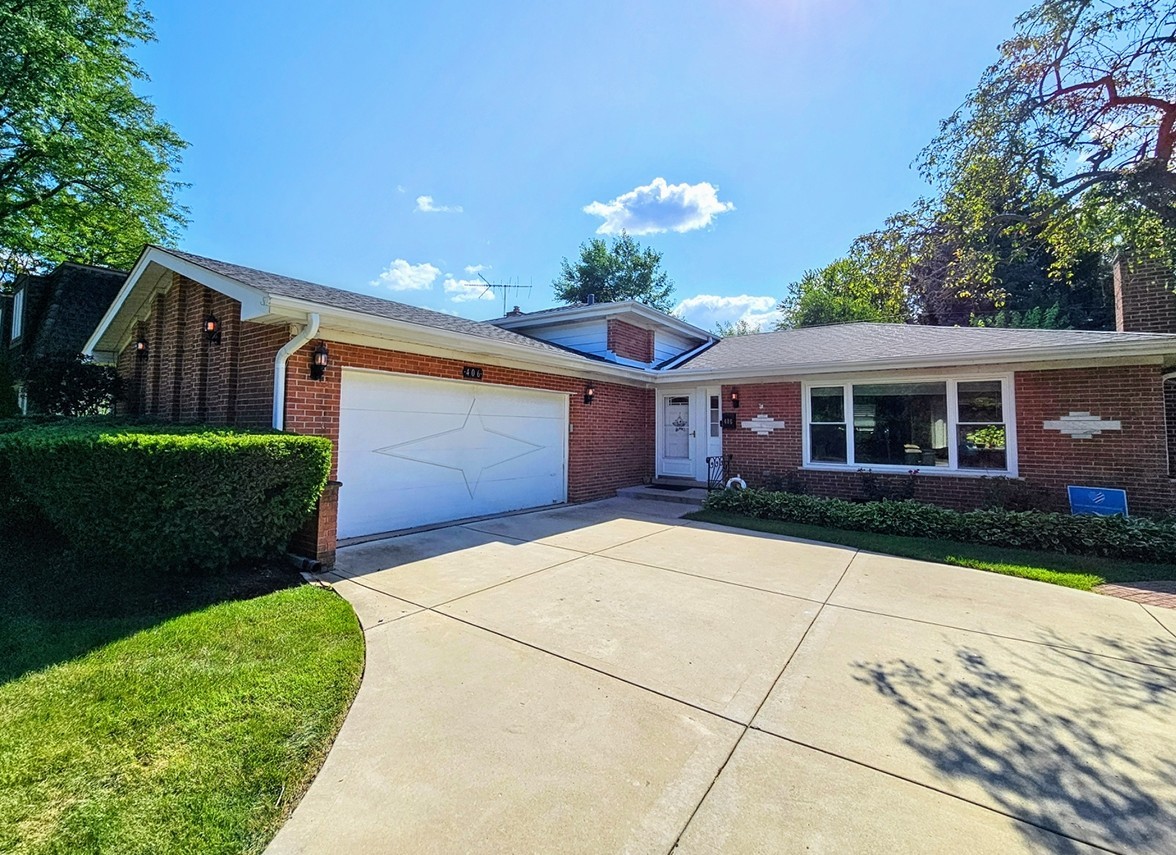 a front view of house with yard