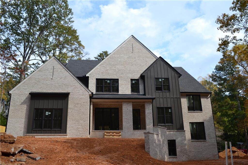 a front view of a house with a garage