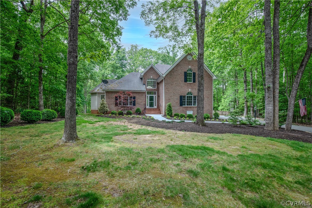 front view of a house with a yard