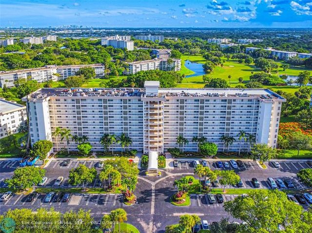 $430,000 | 3510 Oaks Way, Unit 410 | Palm Aire