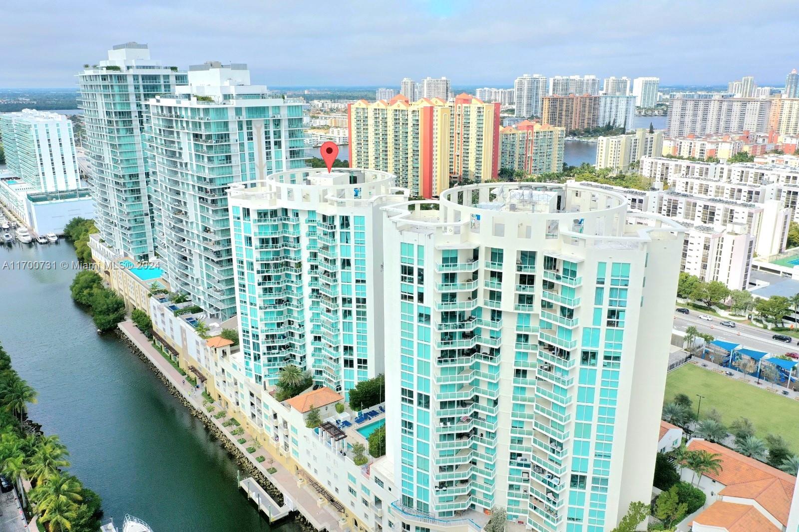 a view of tall buildings from a balcony