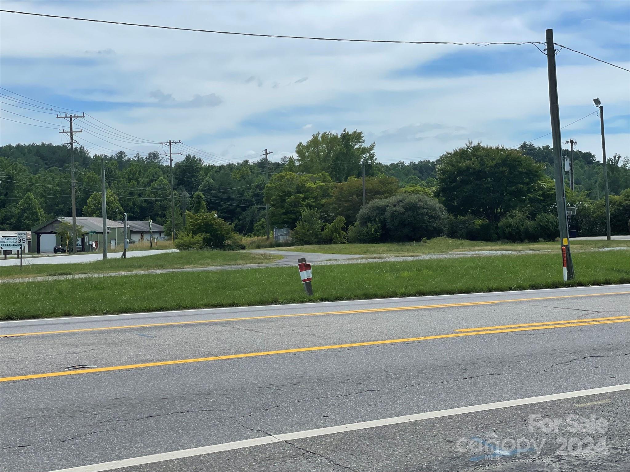 a view of a golf course with a road