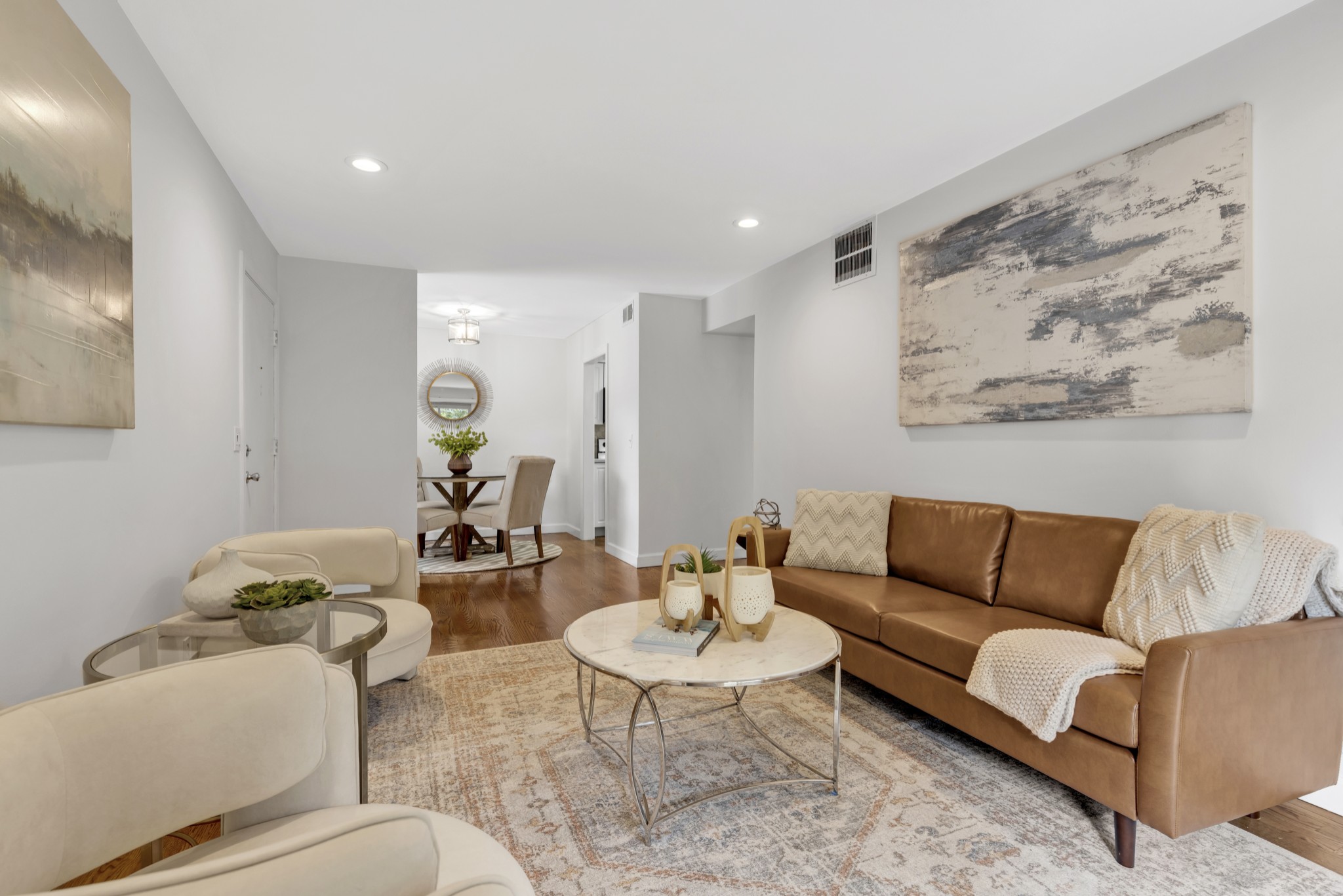 a living room with furniture and a couch