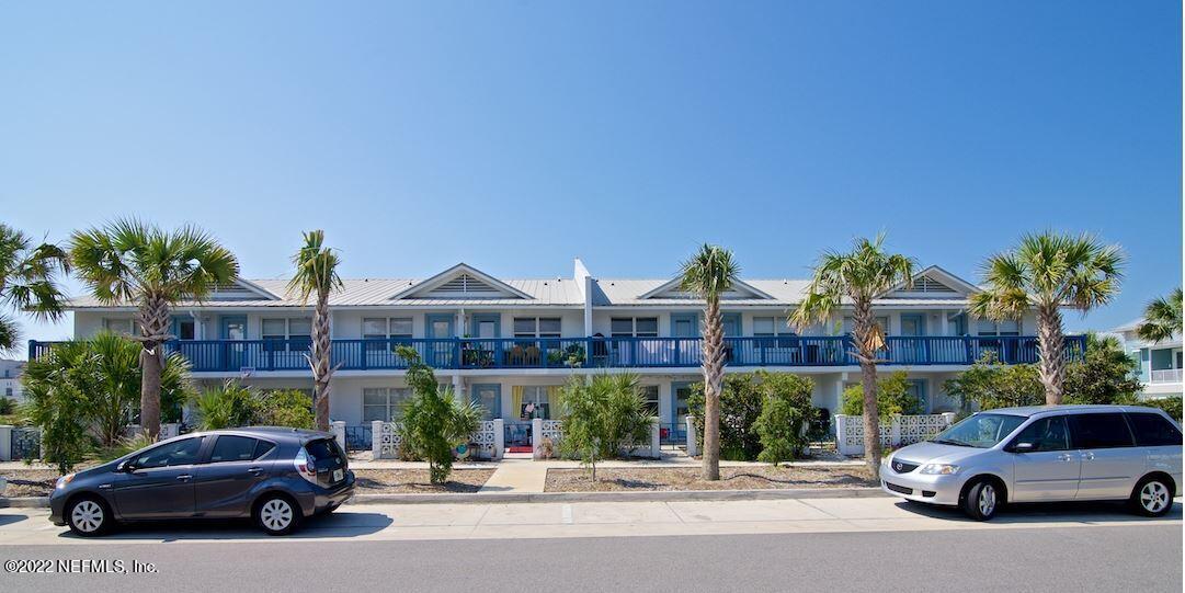 a view of a parked cars in front of a building