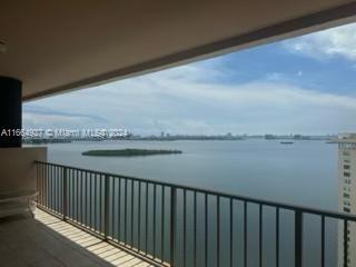 a balcony with an ocean view