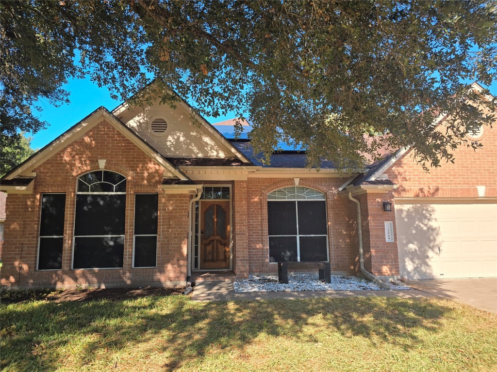 a view of house with front door