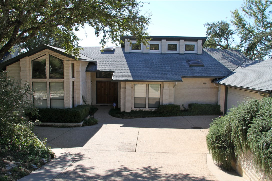 Front of home with beautiful, clean lines. Low-maintenance drought-resistance yard.