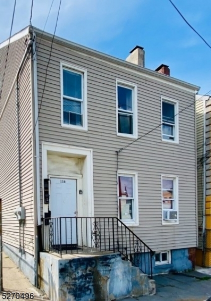 a front view of a house with balcony