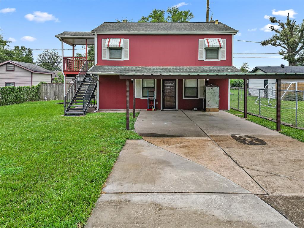 a front view of a house with yard