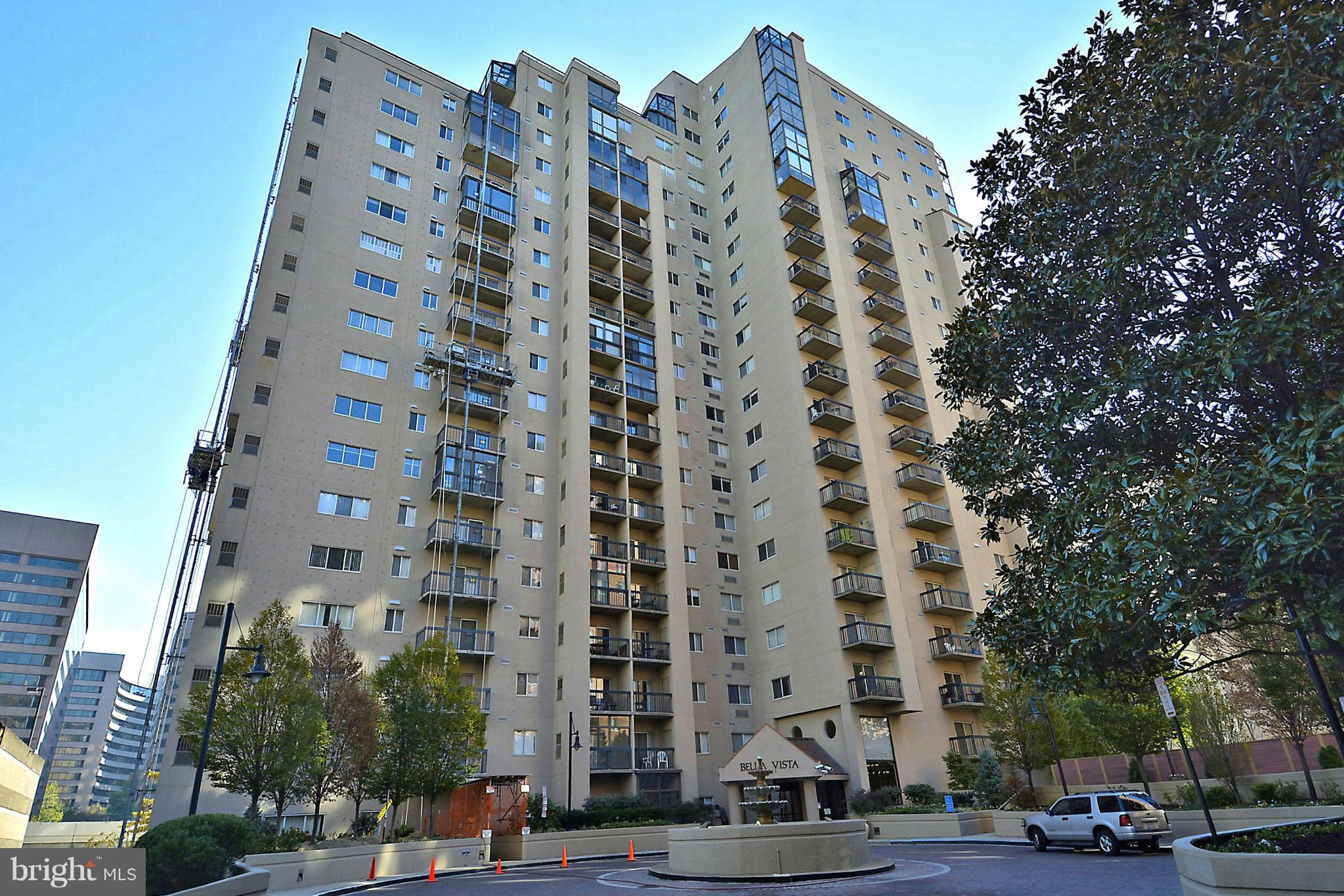 a view of a building with a yard