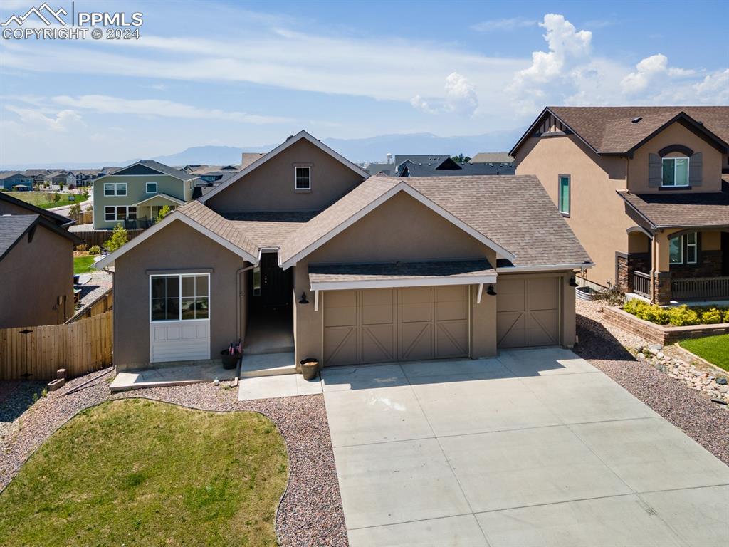 View of front of house with a garage