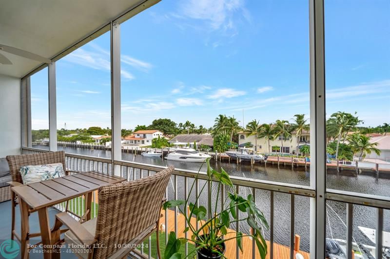 a view of a balcony with lake view