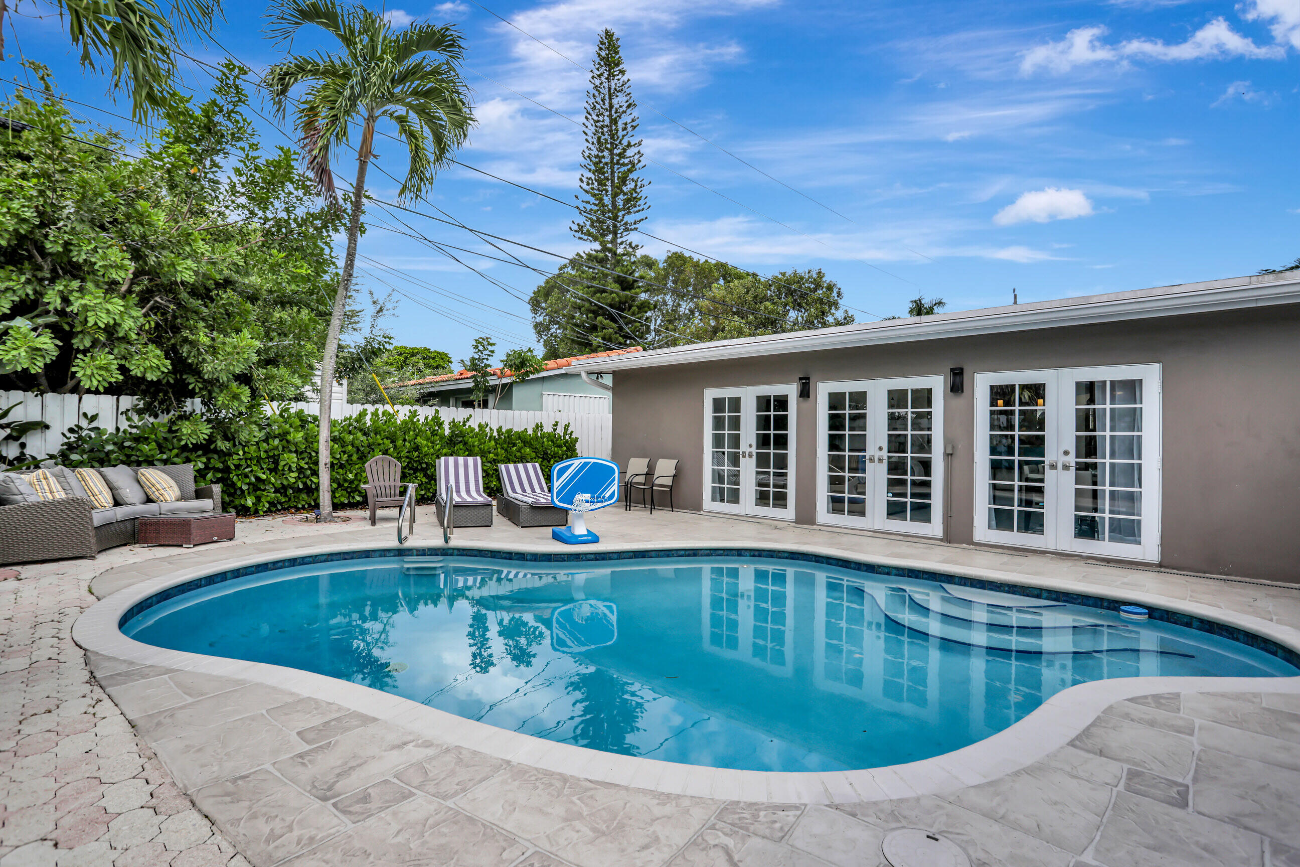 a view of a house with swimming pool