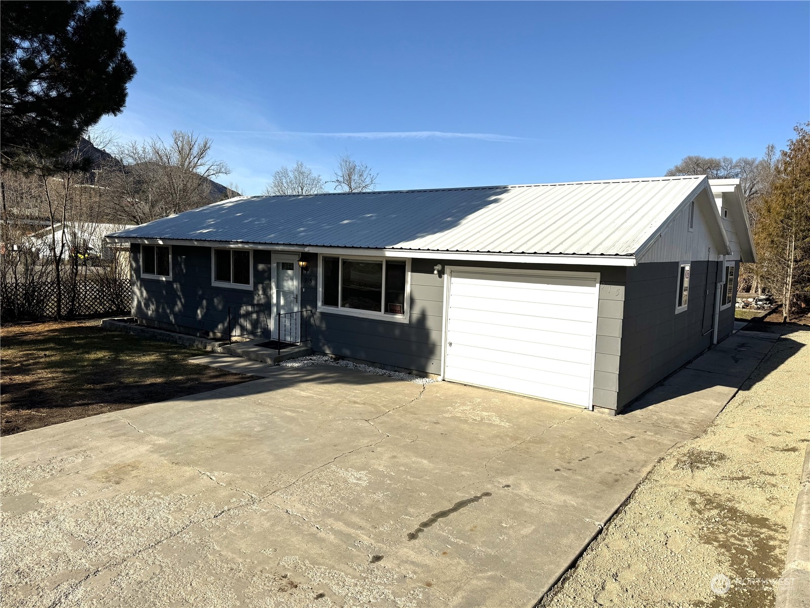 a front view of a house with a patio