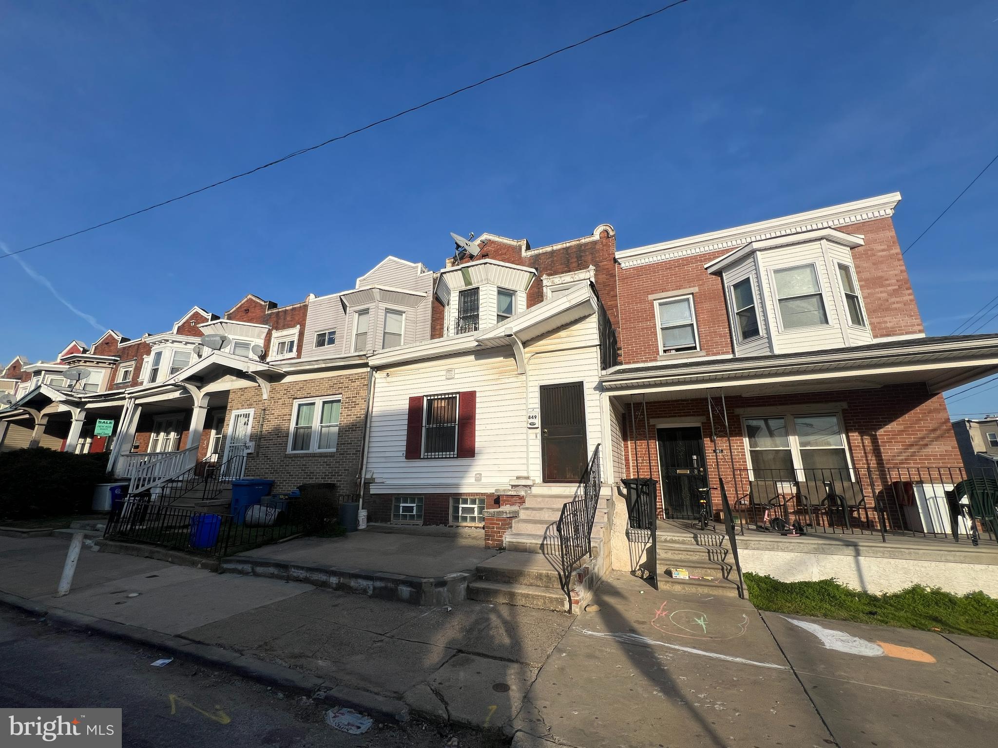 a front view of a building with street view