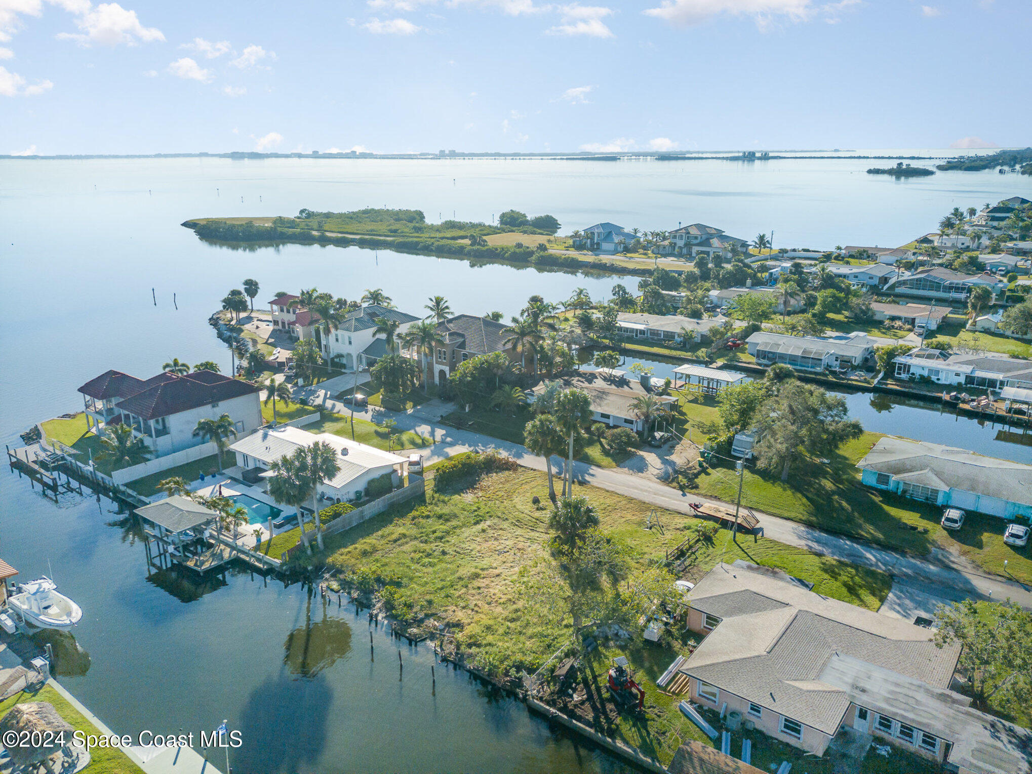 a view of lake and houses with outdoor space