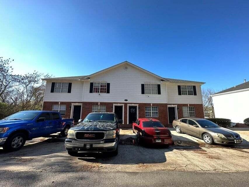 a car parked in front of a house