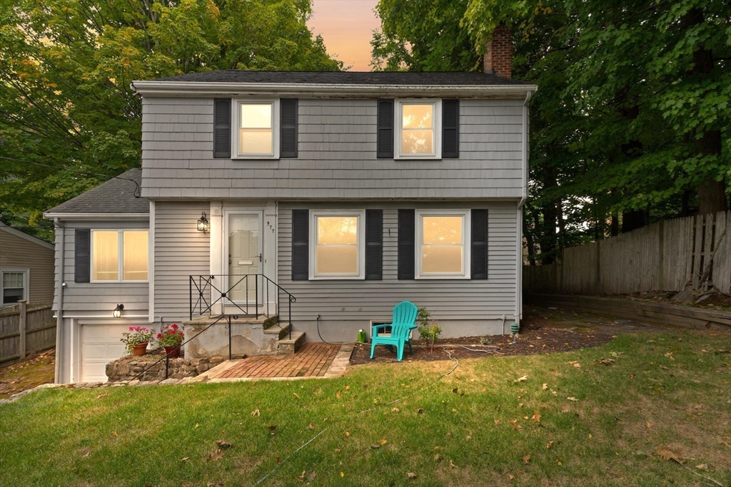 a front view of house with yard