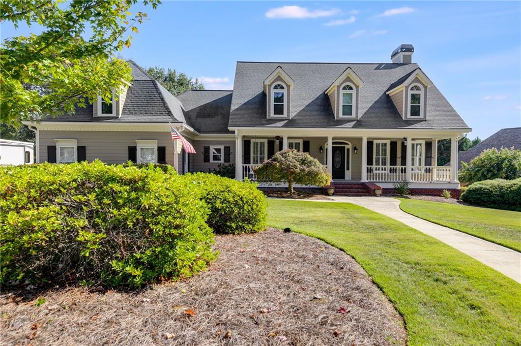 front view of a house with a yard