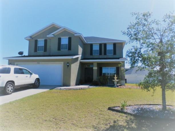 a view of a house with a patio