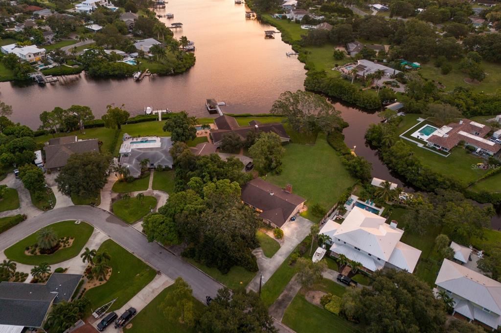 an aerial view of a house with outdoor space