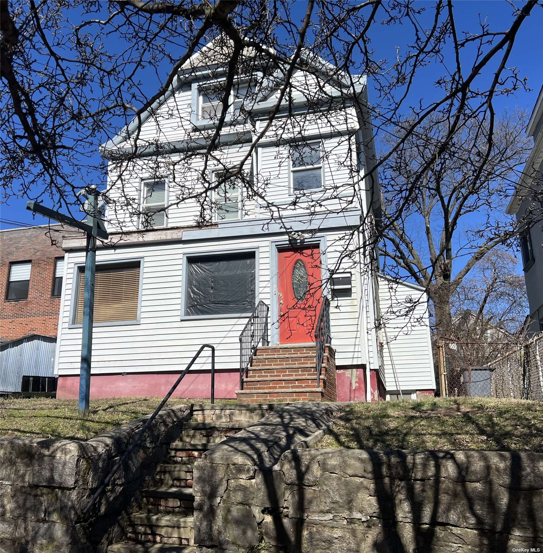 a view of a back yard of the house