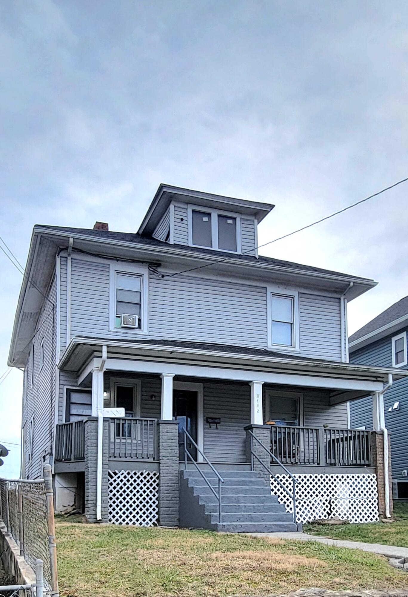 a front view of a house with balcony