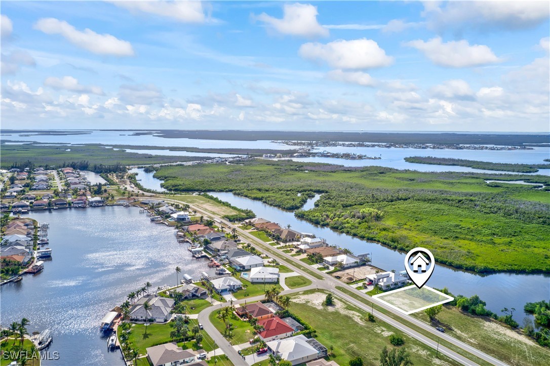 a view of a lake with a big yard