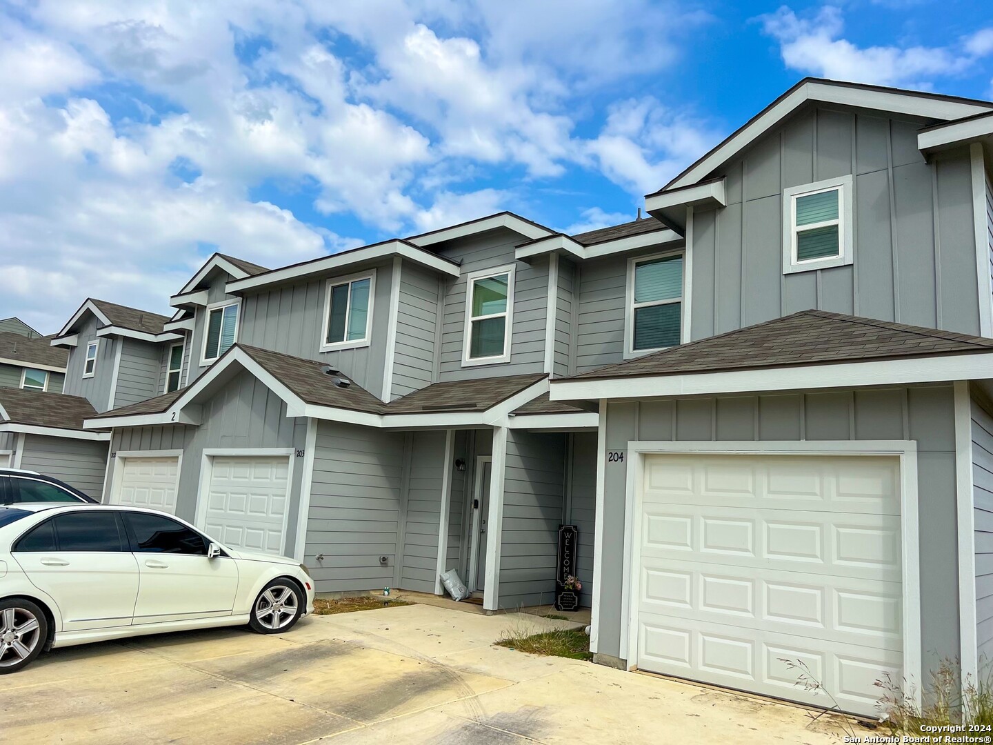 a car parked in front of a house