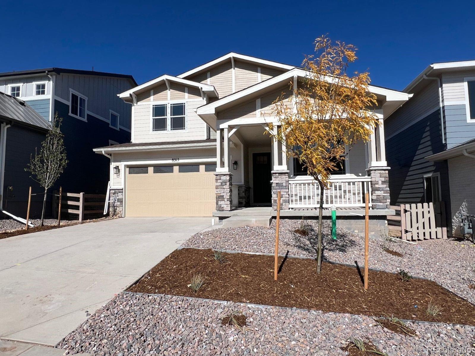 a front view of a house with a porch