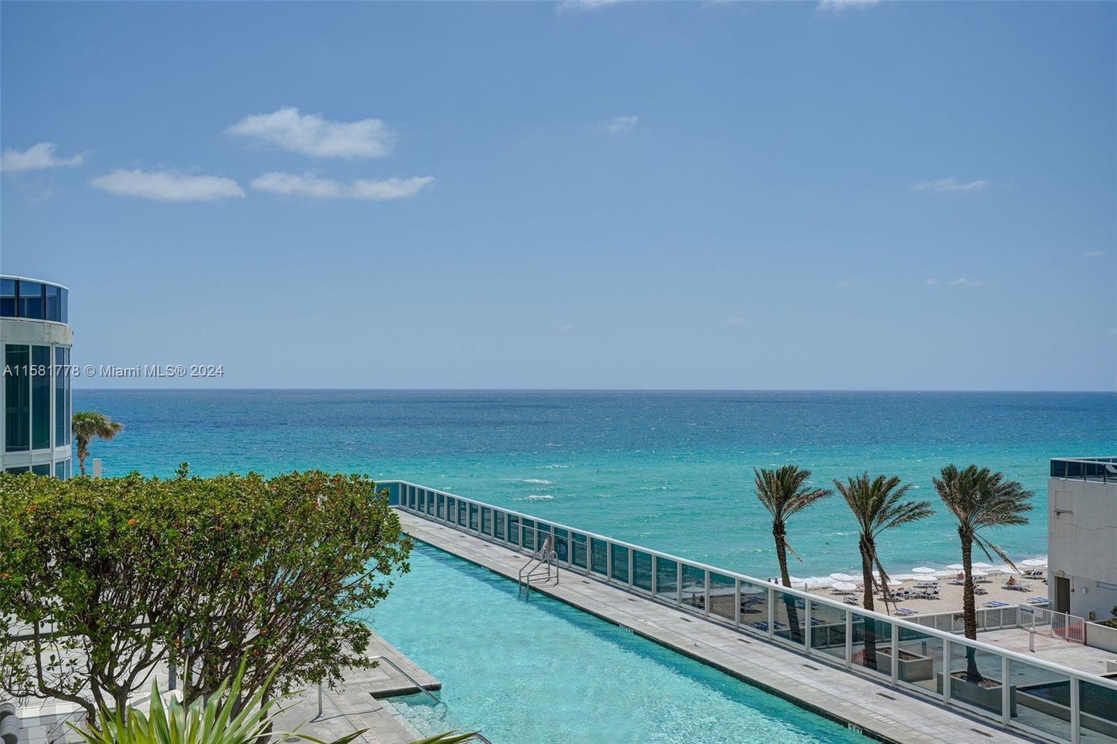 a view of a balcony with ocean view