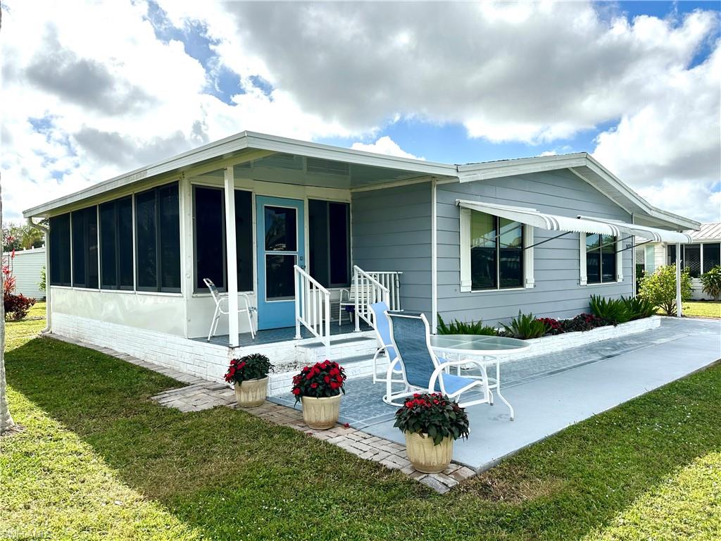 Front of home and lanai/sun room entrance.