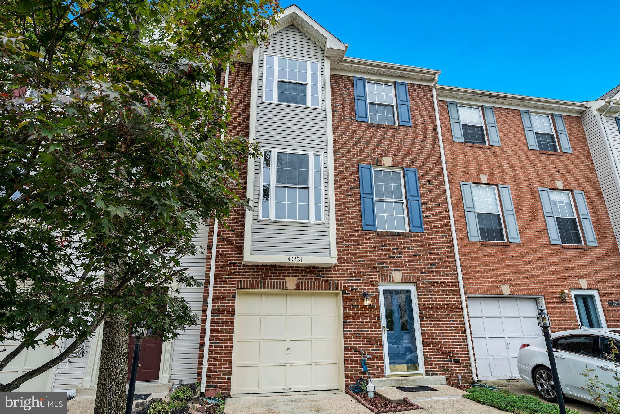 Brick front with extended double bay window