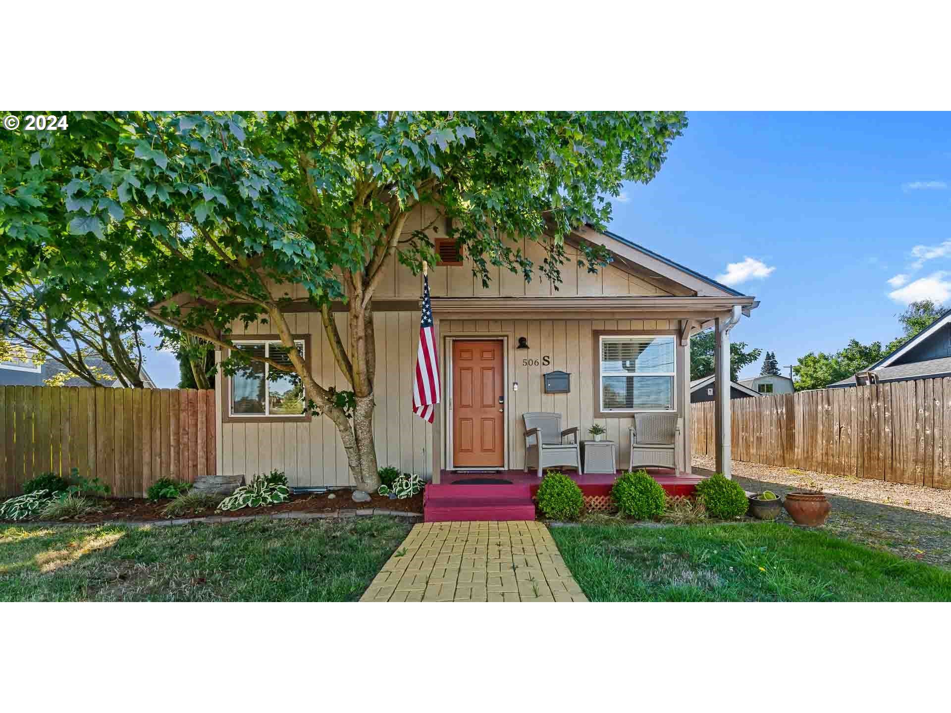 a front view of house with yard